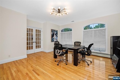 Set on a beautifully landscaped acre with a stunning circular on Old Tappan Golf Course in New Jersey - for sale on GolfHomes.com, golf home, golf lot