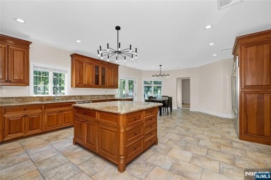 Set on a beautifully landscaped acre with a stunning circular on Old Tappan Golf Course in New Jersey - for sale on GolfHomes.com, golf home, golf lot
