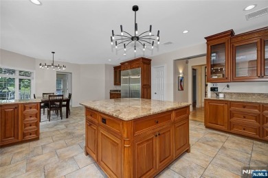 Set on a beautifully landscaped acre with a stunning circular on Old Tappan Golf Course in New Jersey - for sale on GolfHomes.com, golf home, golf lot