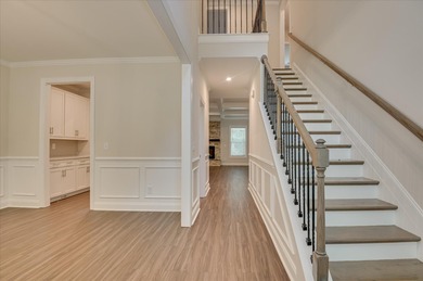 Experience elegant design and everyday functionality in this on Mount Vintage Plantation and Golf Club  in South Carolina - for sale on GolfHomes.com, golf home, golf lot