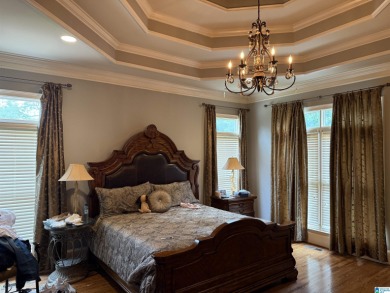 This custom home welcomes you with double front doors, an on Greystone Golf and Country Club-Founders Course in Alabama - for sale on GolfHomes.com, golf home, golf lot