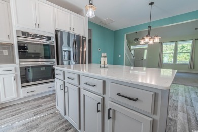 Spacious two-story home with four-bedrooms, two-and-a-half-bath on Shaftesbury Glen Golf and Fish Club in South Carolina - for sale on GolfHomes.com, golf home, golf lot