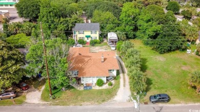 Located just 1,000 feet from the sandy shores of the Atlantic on Whispering Pines in South Carolina - for sale on GolfHomes.com, golf home, golf lot