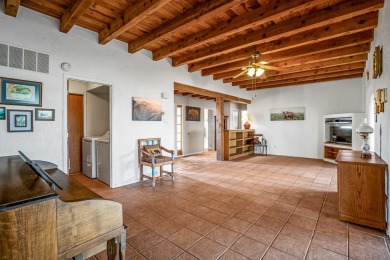 Step through a charming walled courtyard and enter a world of on Pueblo de Cochiti Golf Course in New Mexico - for sale on GolfHomes.com, golf home, golf lot