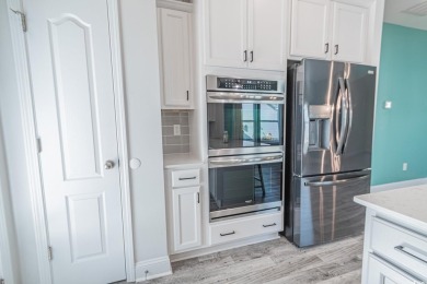 Spacious two-story home with four-bedrooms, two-and-a-half-bath on Shaftesbury Glen Golf and Fish Club in South Carolina - for sale on GolfHomes.com, golf home, golf lot