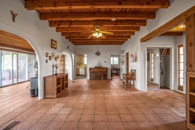 Step through a charming walled courtyard and enter a world of on Pueblo de Cochiti Golf Course in New Mexico - for sale on GolfHomes.com, golf home, golf lot