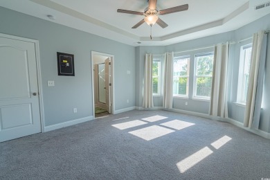 Spacious two-story home with four-bedrooms, two-and-a-half-bath on Shaftesbury Glen Golf and Fish Club in South Carolina - for sale on GolfHomes.com, golf home, golf lot