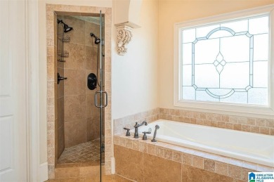 This custom home welcomes you with double front doors, an on Greystone Golf and Country Club-Founders Course in Alabama - for sale on GolfHomes.com, golf home, golf lot