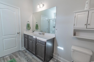 Spacious two-story home with four-bedrooms, two-and-a-half-bath on Shaftesbury Glen Golf and Fish Club in South Carolina - for sale on GolfHomes.com, golf home, golf lot