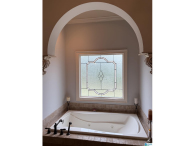 This custom home welcomes you with double front doors, an on Greystone Golf and Country Club-Founders Course in Alabama - for sale on GolfHomes.com, golf home, golf lot