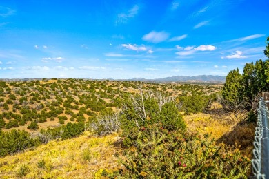 Step through a charming walled courtyard and enter a world of on Pueblo de Cochiti Golf Course in New Mexico - for sale on GolfHomes.com, golf home, golf lot