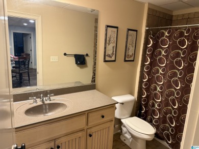 This custom home welcomes you with double front doors, an on Greystone Golf and Country Club-Founders Course in Alabama - for sale on GolfHomes.com, golf home, golf lot