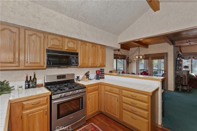 SITUATED AT THE BASE OF BEAR MOUNTAIN SKI RESORT AND OVERLOOKING on Big Bear Mountain Ski and Golf Resort in California - for sale on GolfHomes.com, golf home, golf lot