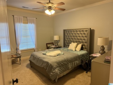 This custom home welcomes you with double front doors, an on Greystone Golf and Country Club-Founders Course in Alabama - for sale on GolfHomes.com, golf home, golf lot