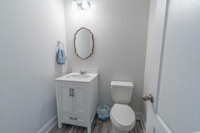 Spacious two-story home with four-bedrooms, two-and-a-half-bath on Shaftesbury Glen Golf and Fish Club in South Carolina - for sale on GolfHomes.com, golf home, golf lot