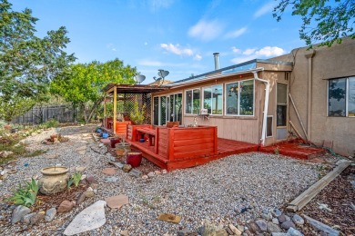 Step through a charming walled courtyard and enter a world of on Pueblo de Cochiti Golf Course in New Mexico - for sale on GolfHomes.com, golf home, golf lot