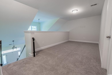 Spacious two-story home with four-bedrooms, two-and-a-half-bath on Shaftesbury Glen Golf and Fish Club in South Carolina - for sale on GolfHomes.com, golf home, golf lot