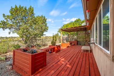 Step through a charming walled courtyard and enter a world of on Pueblo de Cochiti Golf Course in New Mexico - for sale on GolfHomes.com, golf home, golf lot