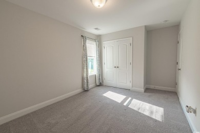 Spacious two-story home with four-bedrooms, two-and-a-half-bath on Shaftesbury Glen Golf and Fish Club in South Carolina - for sale on GolfHomes.com, golf home, golf lot