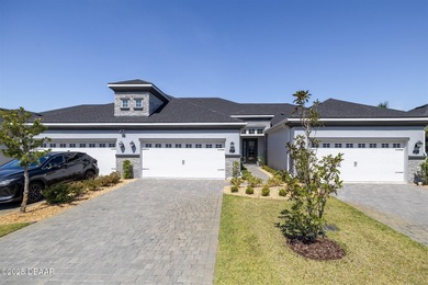 Better than new and beautifully upgraded! This exceptional on Plantation Bay Golf and Country Club in Florida - for sale on GolfHomes.com, golf home, golf lot
