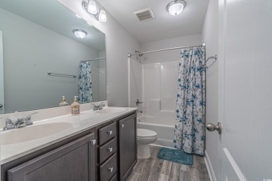 Spacious two-story home with four-bedrooms, two-and-a-half-bath on Shaftesbury Glen Golf and Fish Club in South Carolina - for sale on GolfHomes.com, golf home, golf lot