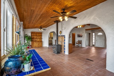 Step through a charming walled courtyard and enter a world of on Pueblo de Cochiti Golf Course in New Mexico - for sale on GolfHomes.com, golf home, golf lot