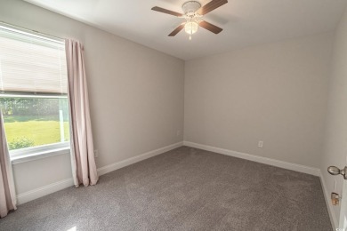 Spacious two-story home with four-bedrooms, two-and-a-half-bath on Shaftesbury Glen Golf and Fish Club in South Carolina - for sale on GolfHomes.com, golf home, golf lot