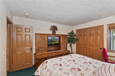 SITUATED AT THE BASE OF BEAR MOUNTAIN SKI RESORT AND OVERLOOKING on Big Bear Mountain Ski and Golf Resort in California - for sale on GolfHomes.com, golf home, golf lot