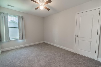 Spacious two-story home with four-bedrooms, two-and-a-half-bath on Shaftesbury Glen Golf and Fish Club in South Carolina - for sale on GolfHomes.com, golf home, golf lot