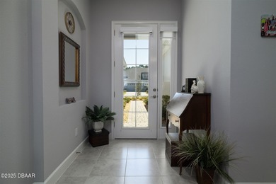 Better than new and beautifully upgraded! This exceptional on Plantation Bay Golf and Country Club in Florida - for sale on GolfHomes.com, golf home, golf lot