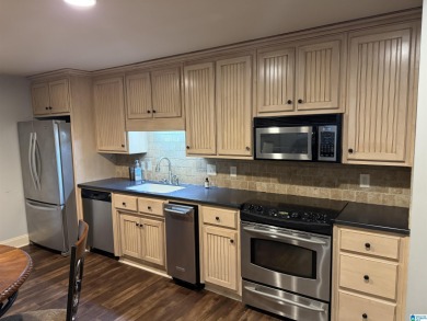 This custom home welcomes you with double front doors, an on Greystone Golf and Country Club-Founders Course in Alabama - for sale on GolfHomes.com, golf home, golf lot