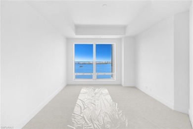 An INCREDIBLE value for a residence in the AMAZING building on Bonita Bay West in Florida - for sale on GolfHomes.com, golf home, golf lot