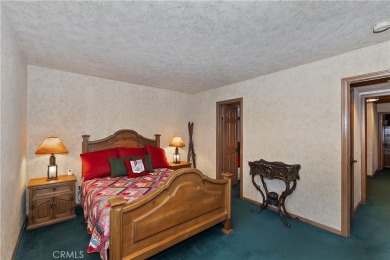 SITUATED AT THE BASE OF BEAR MOUNTAIN SKI RESORT AND OVERLOOKING on Big Bear Mountain Ski and Golf Resort in California - for sale on GolfHomes.com, golf home, golf lot