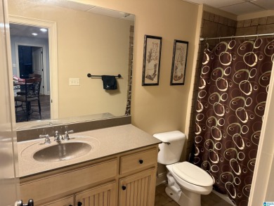 This custom home welcomes you with double front doors, an on Greystone Golf and Country Club-Founders Course in Alabama - for sale on GolfHomes.com, golf home, golf lot