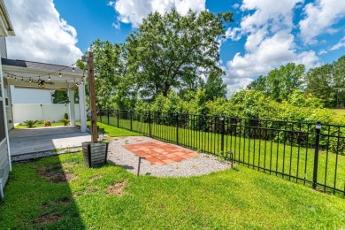 Spacious two-story home with four-bedrooms, two-and-a-half-bath on Shaftesbury Glen Golf and Fish Club in South Carolina - for sale on GolfHomes.com, golf home, golf lot