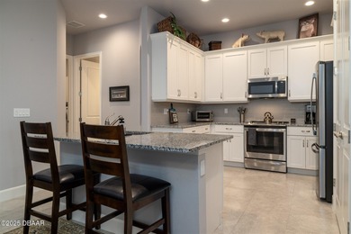 Better than new and beautifully upgraded! This exceptional on Plantation Bay Golf and Country Club in Florida - for sale on GolfHomes.com, golf home, golf lot