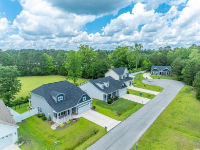 Spacious two-story home with four-bedrooms, two-and-a-half-bath on Shaftesbury Glen Golf and Fish Club in South Carolina - for sale on GolfHomes.com, golf home, golf lot
