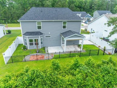 Spacious two-story home with four-bedrooms, two-and-a-half-bath on Shaftesbury Glen Golf and Fish Club in South Carolina - for sale on GolfHomes.com, golf home, golf lot