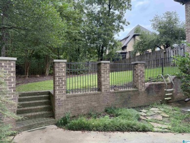 This custom home welcomes you with double front doors, an on Greystone Golf and Country Club-Founders Course in Alabama - for sale on GolfHomes.com, golf home, golf lot