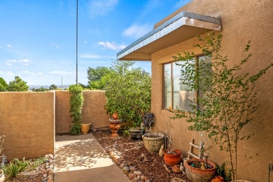 Step through a charming walled courtyard and enter a world of on Pueblo de Cochiti Golf Course in New Mexico - for sale on GolfHomes.com, golf home, golf lot