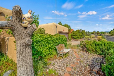 Step through a charming walled courtyard and enter a world of on Pueblo de Cochiti Golf Course in New Mexico - for sale on GolfHomes.com, golf home, golf lot