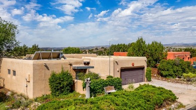 Step through a charming walled courtyard and enter a world of on Pueblo de Cochiti Golf Course in New Mexico - for sale on GolfHomes.com, golf home, golf lot