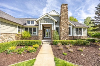 Experience refined waterfront living at its finest with this on Tullymore Golf Club in Michigan - for sale on GolfHomes.com, golf home, golf lot