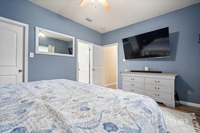 Welcome home to this precious cottage tucked away on a quiet on Lake Forest Yacht and Country Club in Alabama - for sale on GolfHomes.com, golf home, golf lot