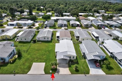 RARE OPPORTUNITY to own this gently used home on TWO LOTS on Barefoot Bay Golf Course in Florida - for sale on GolfHomes.com, golf home, golf lot