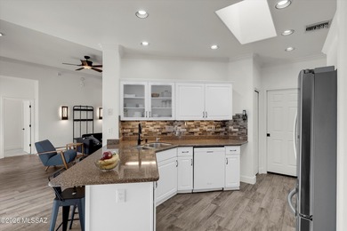 Beautifully maintained and thoughtfully updated, this inviting on El Conquistador Country Club - Canada in Arizona - for sale on GolfHomes.com, golf home, golf lot