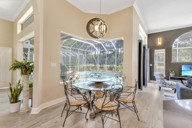 Tucked behind the private gates of the prestigious Emerald Bay on Emerald Bay Golf Club in Florida - for sale on GolfHomes.com, golf home, golf lot