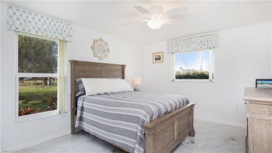 Experience long, unobstructed lake views and relaxed living just on The Glades Golf and Country Club in Florida - for sale on GolfHomes.com, golf home, golf lot