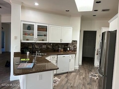 Beautifully maintained and thoughtfully updated, this inviting on El Conquistador Country Club - Canada in Arizona - for sale on GolfHomes.com, golf home, golf lot