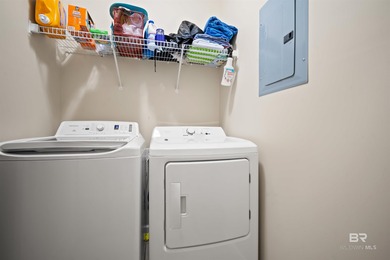 Welcome home to this precious cottage tucked away on a quiet on Lake Forest Yacht and Country Club in Alabama - for sale on GolfHomes.com, golf home, golf lot